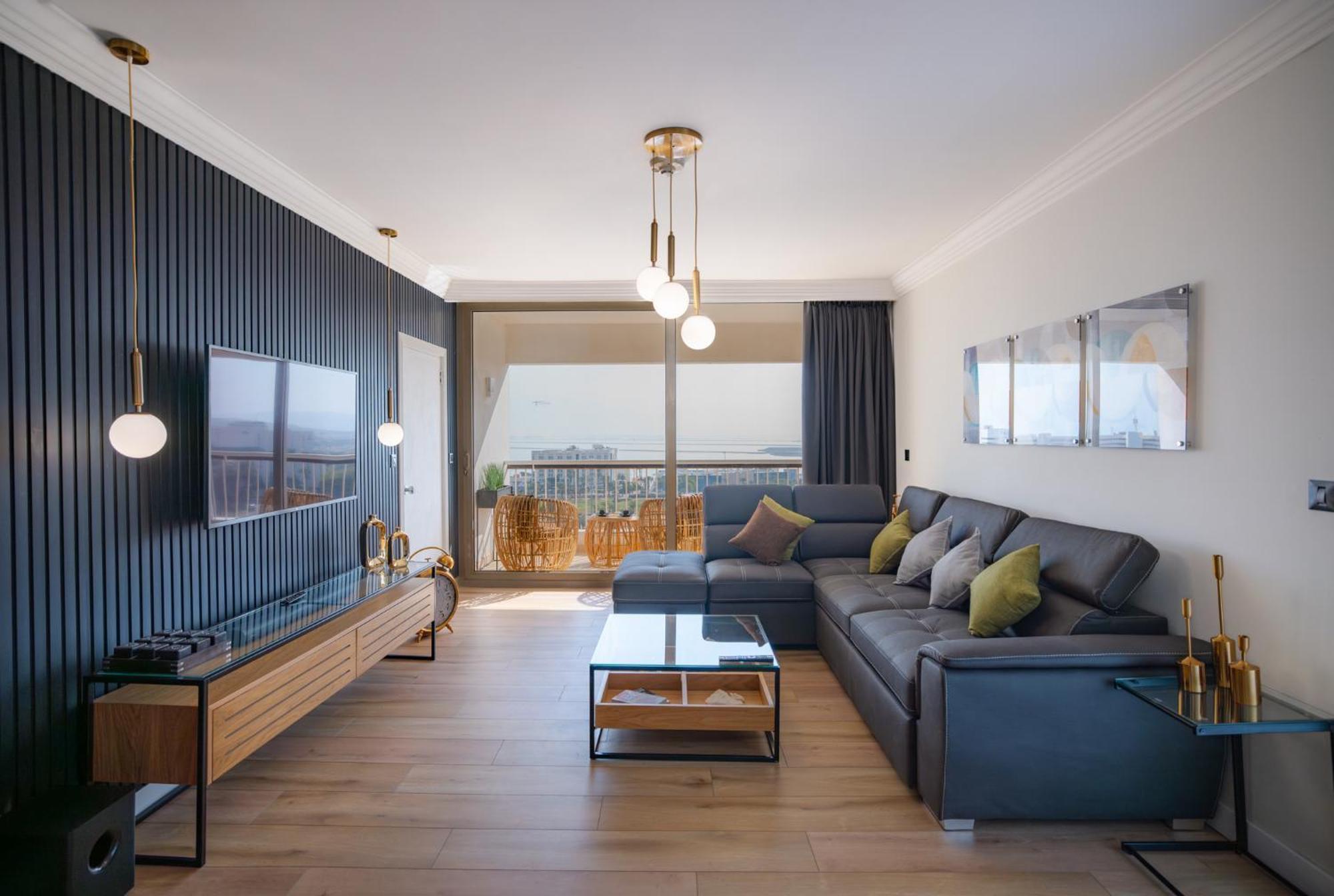 David Dead Sea Resort & Spa Ejn Bokek Exteriér fotografie A living room in a modern apartment